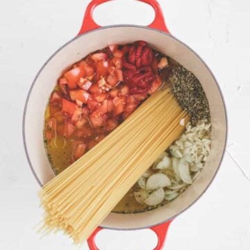 one pot pasta ingredients in a red pot