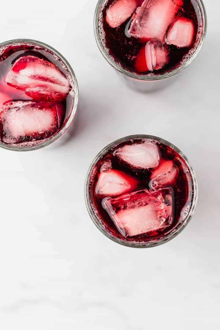 agua de jamaica served over ice in glasses