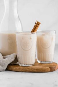 almond milk horchata in glasses on a board