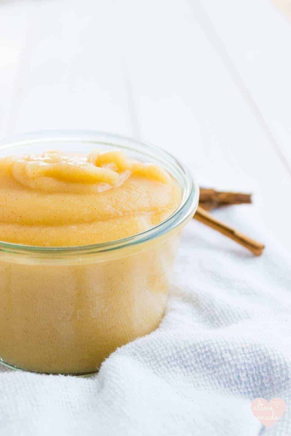 Steamed Applesauce with Cinnamon on a white background