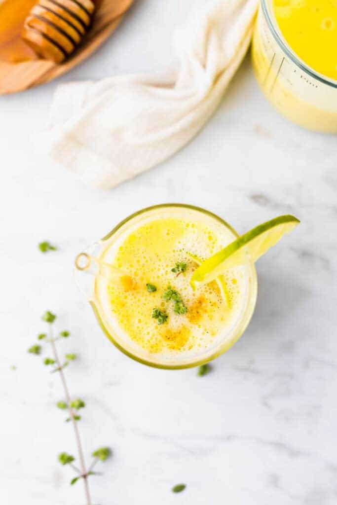 Indian mango drink in a glass from above