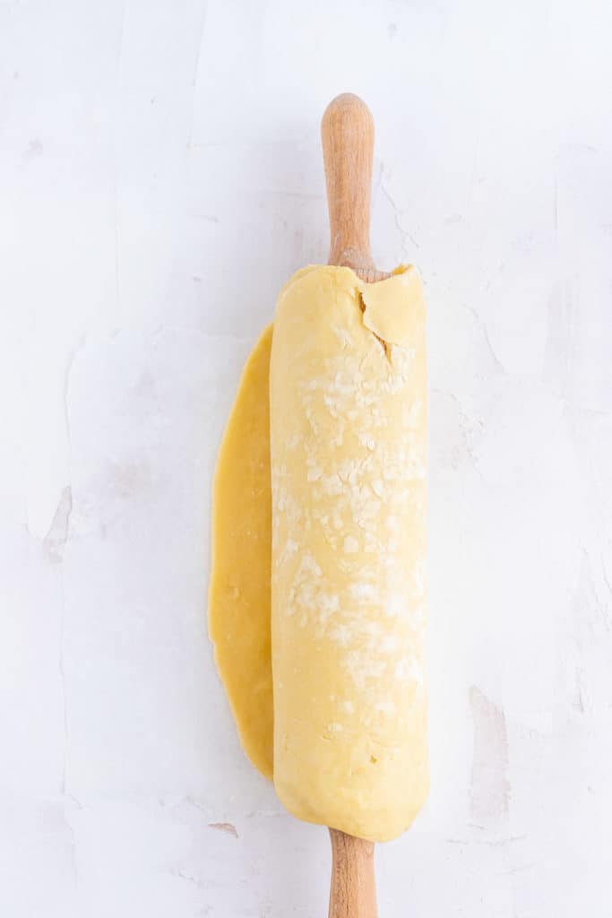 Homemade Pie Crust Rolled up on Rolling Pin