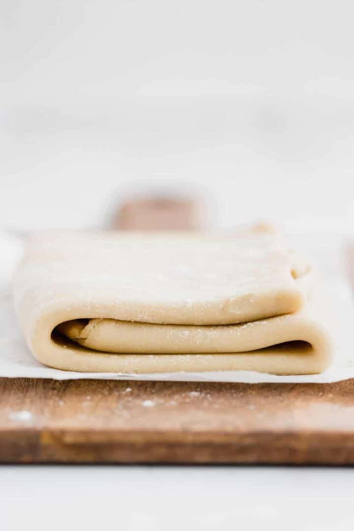 homemade puff pastry on a wooden board