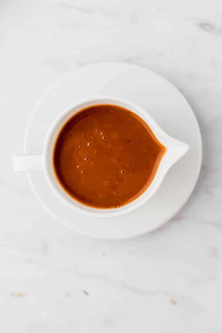 vegan brown gravy served on a marble table