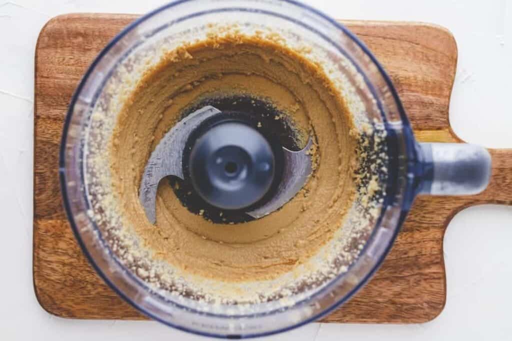 how to make tahini - blend sesame seeds in a food processor