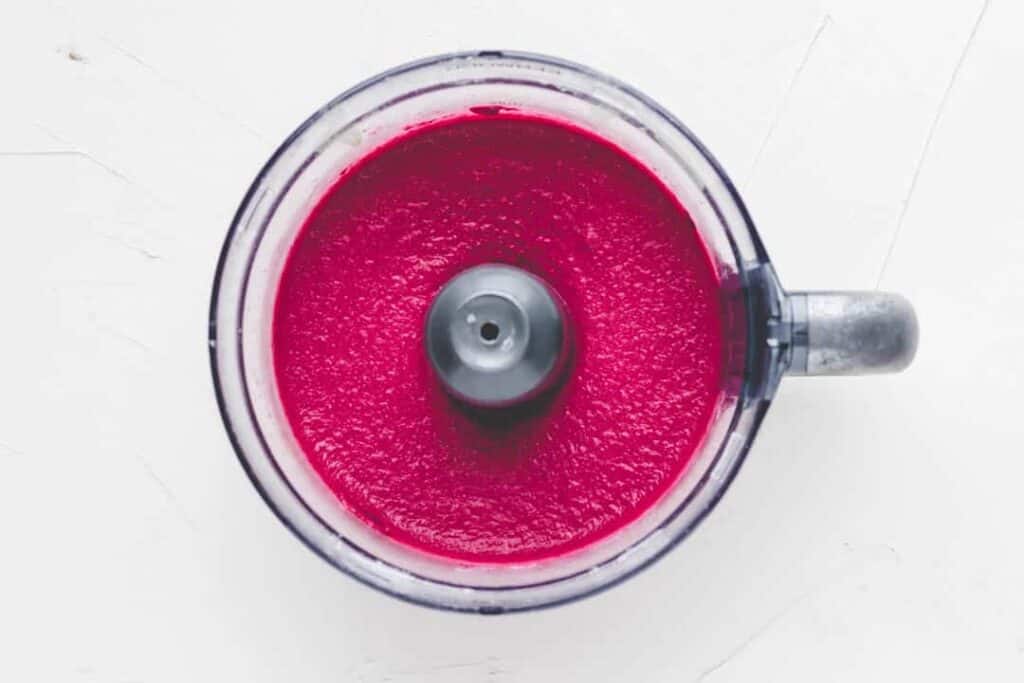 blended beet hummus in a food processor
