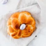 easter bread with three ropes and a easter chocolate egg in the middle