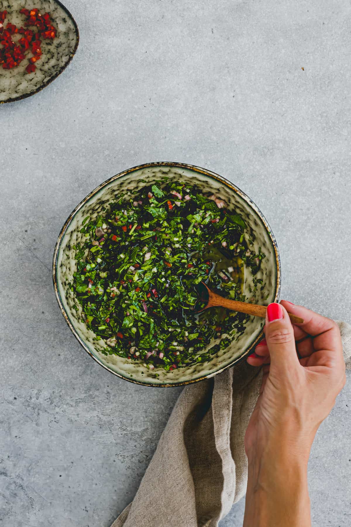 chimichurri with cilantro and parsley in a bowl