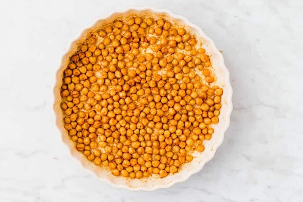lighty roased chickpeas in a baking dish