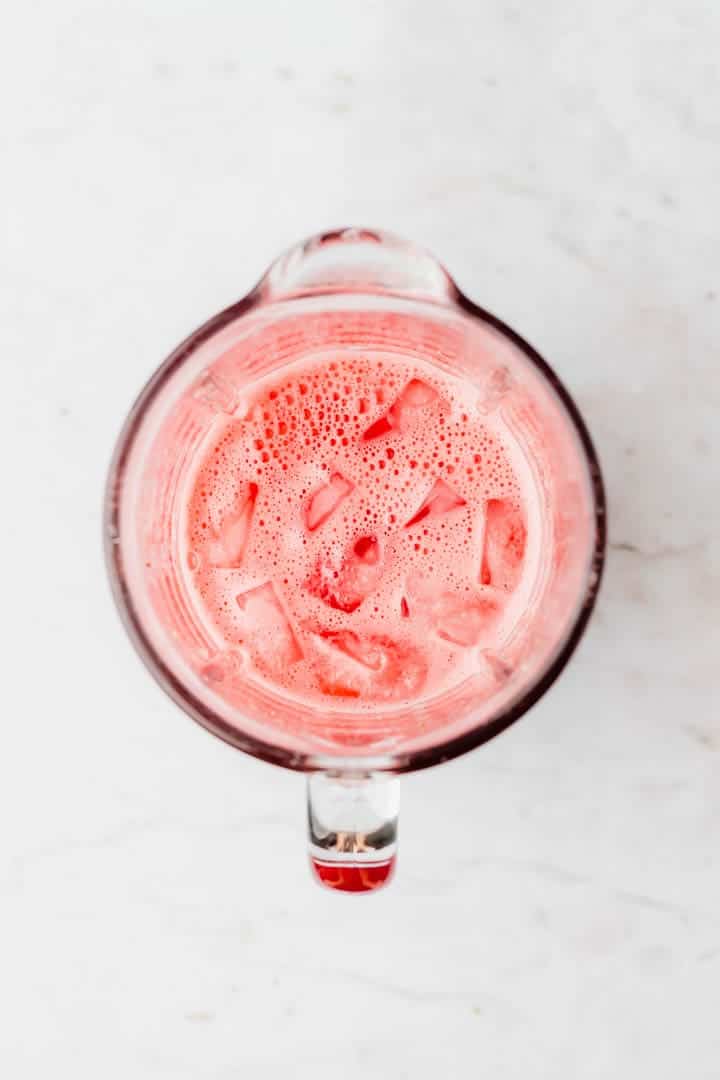 agua de sandia with ice in a blender