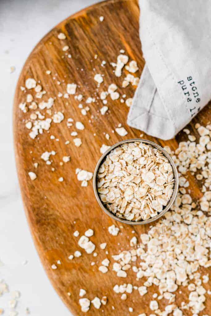 rolled oats on a wooden plate