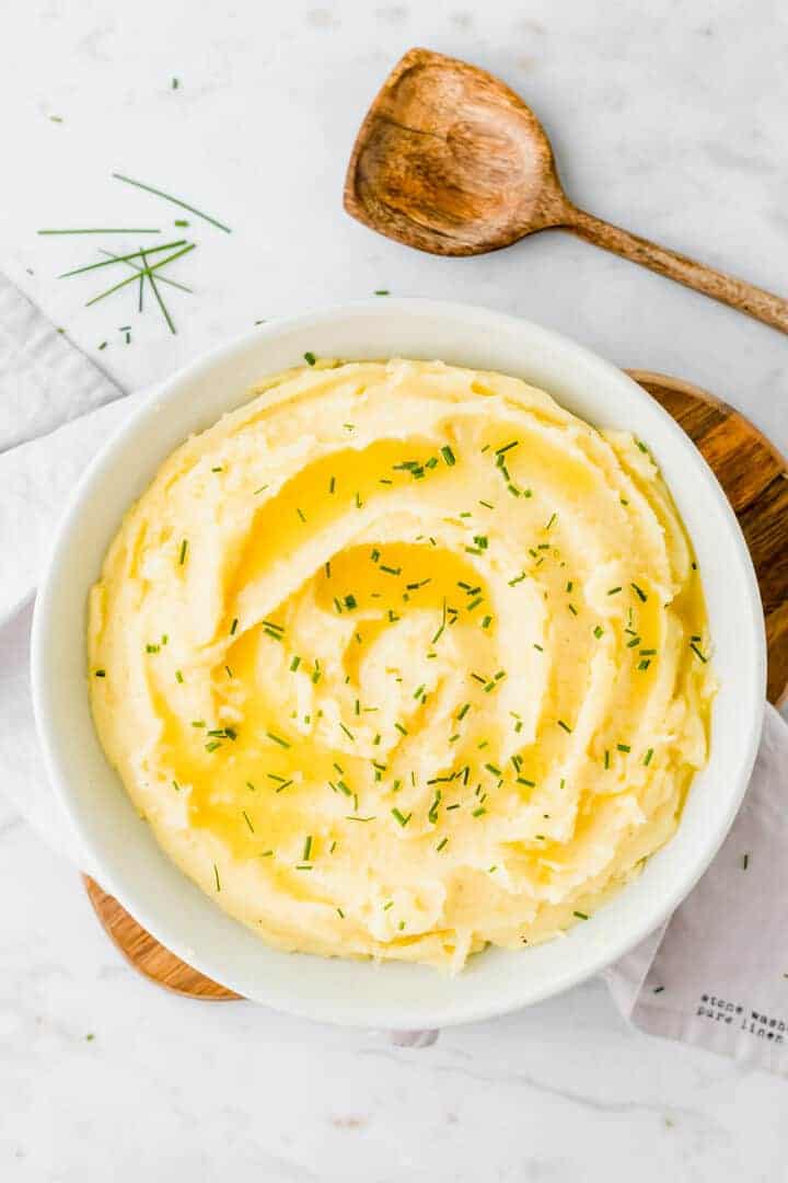 vegan mashed potatoes served in a blue bowl