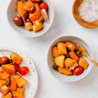 sheet pan veggies with pumpkin, olives, sweet potato, and cherry tomatoes