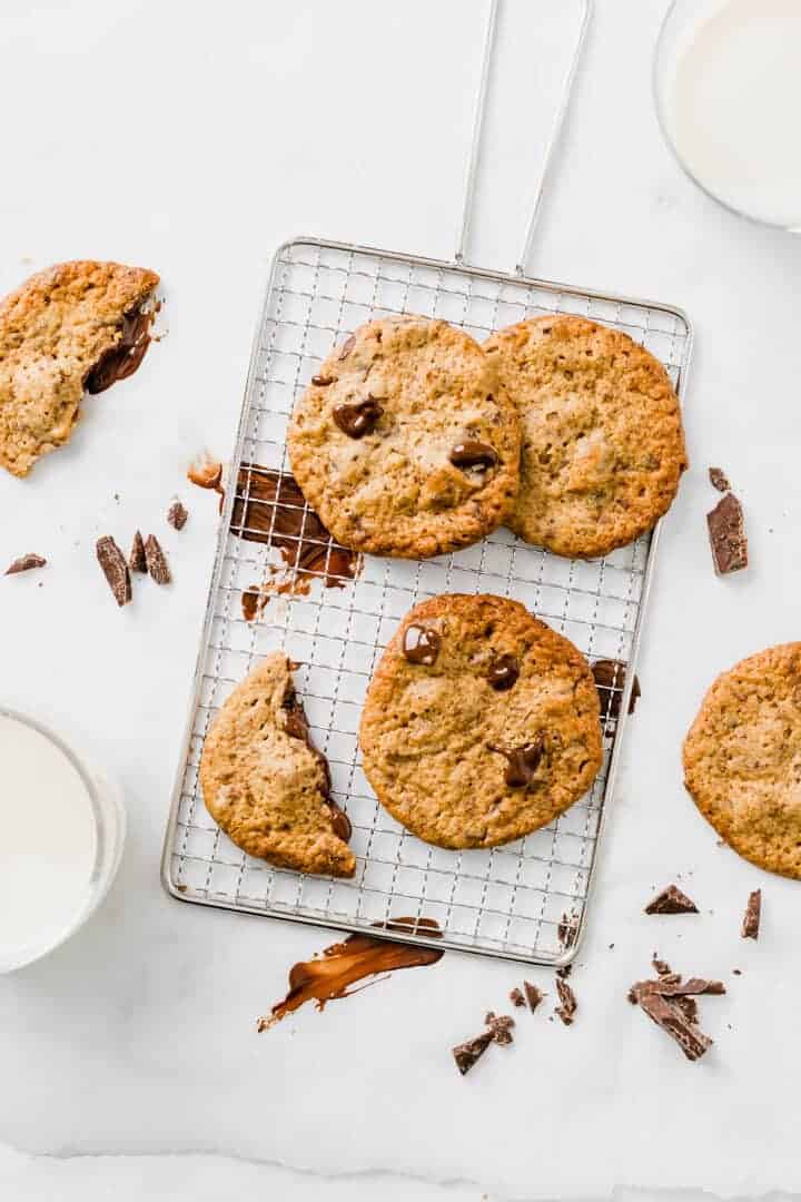 Vegan Peanut Butter Chocolate Chip Cookies on a silver cooling rack