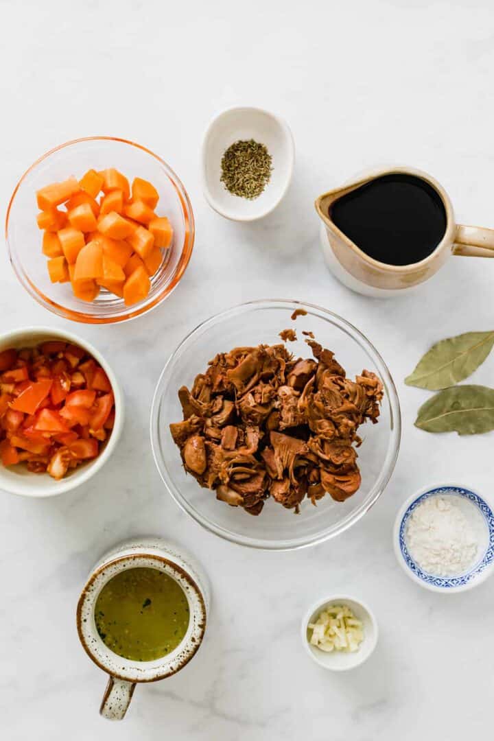 ingredients for vegan jackfruit stew on a table