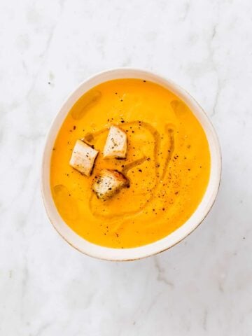 vegan carrot soup with orange and croutons