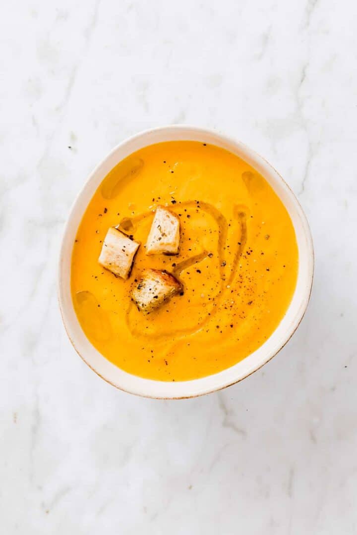 vegan carrot soup with orange and croutons