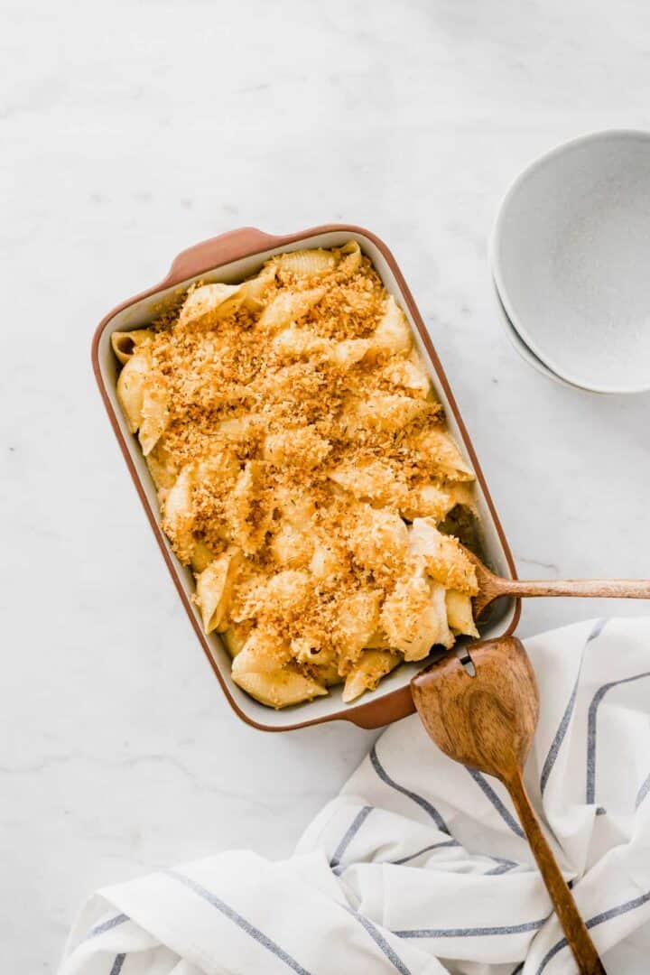 vegan baked mac and cheese in a blue baking dish