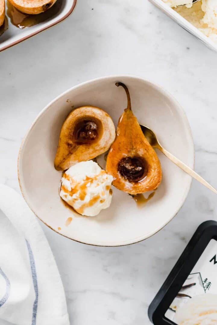 caramelized pears and ice cream served in a small bowl