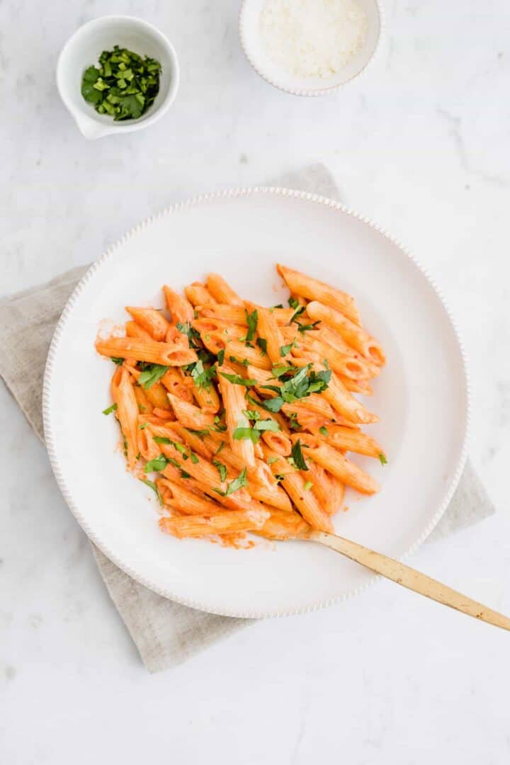 penne with vegan vodka sauce served in a plate
