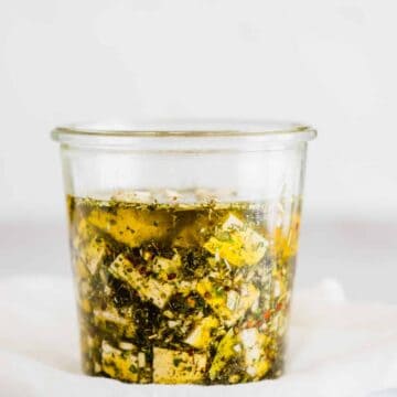 vegan feta cheese marinated with olive oil in a mason jar