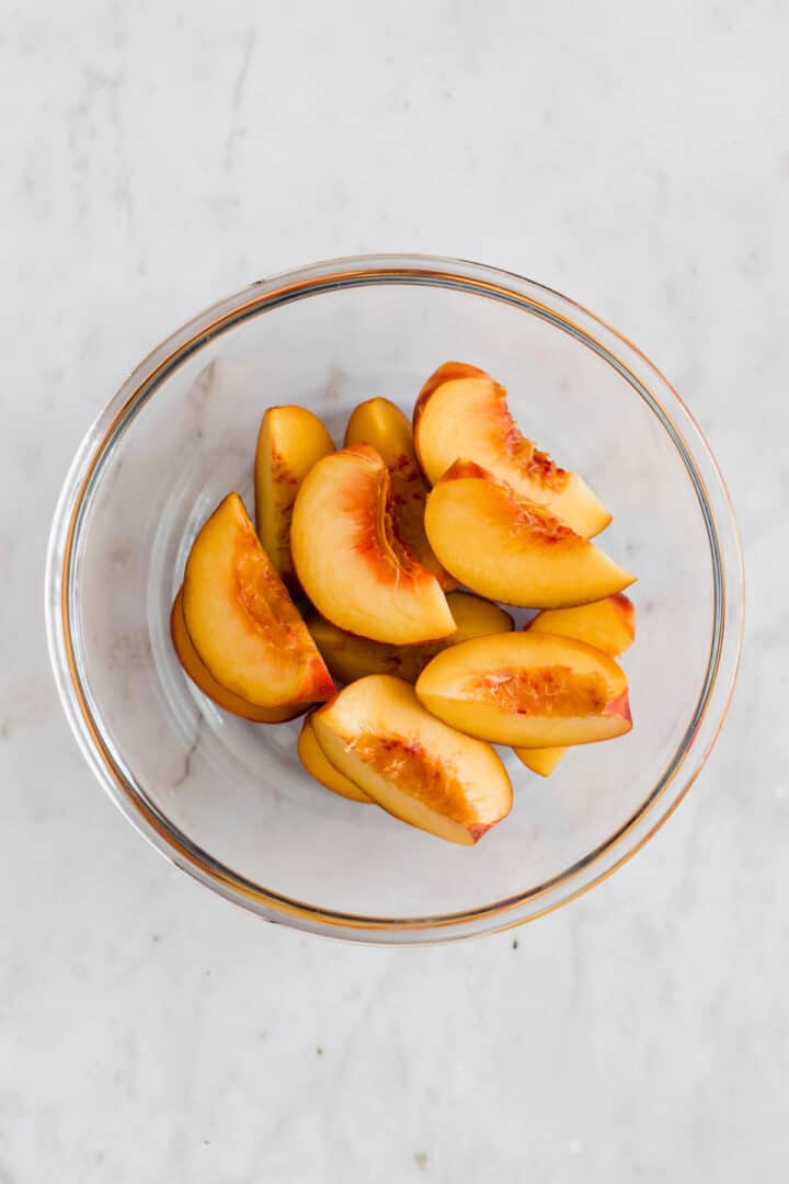 peach wedges in a bowl
