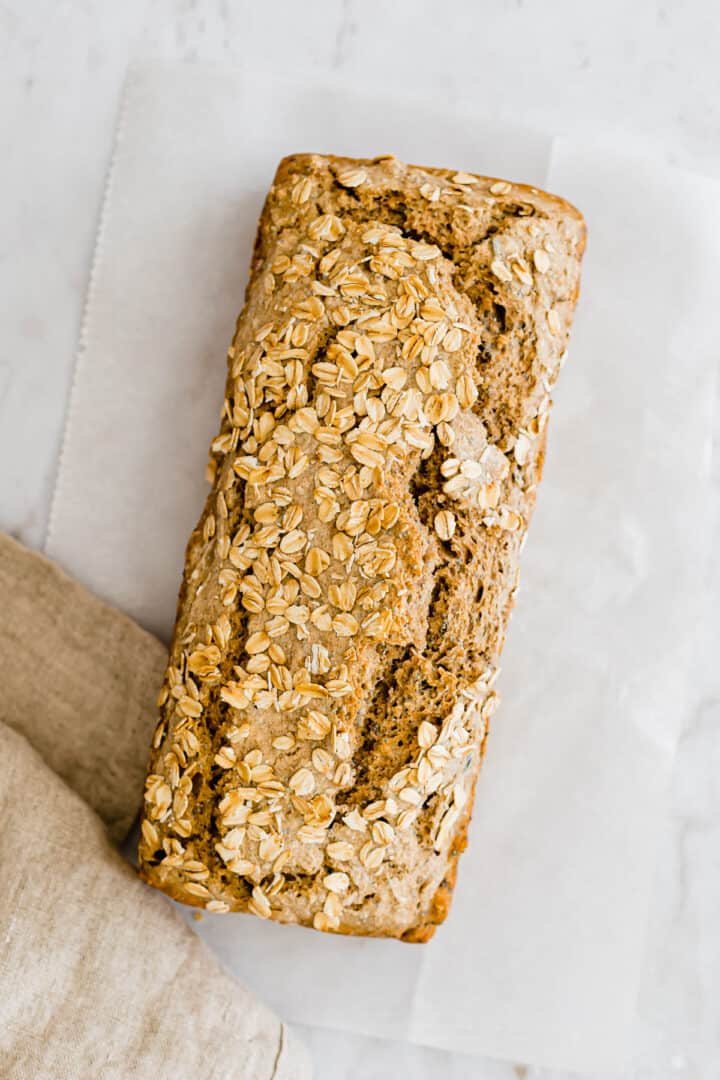 freshly baked no yeast bread with rolled oats on top