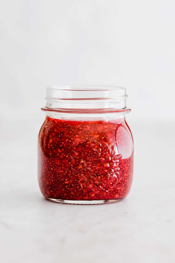 a mason jar filled with homemade chia jam