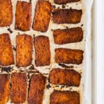 baked vegan bacon made with tofu on a baking tray