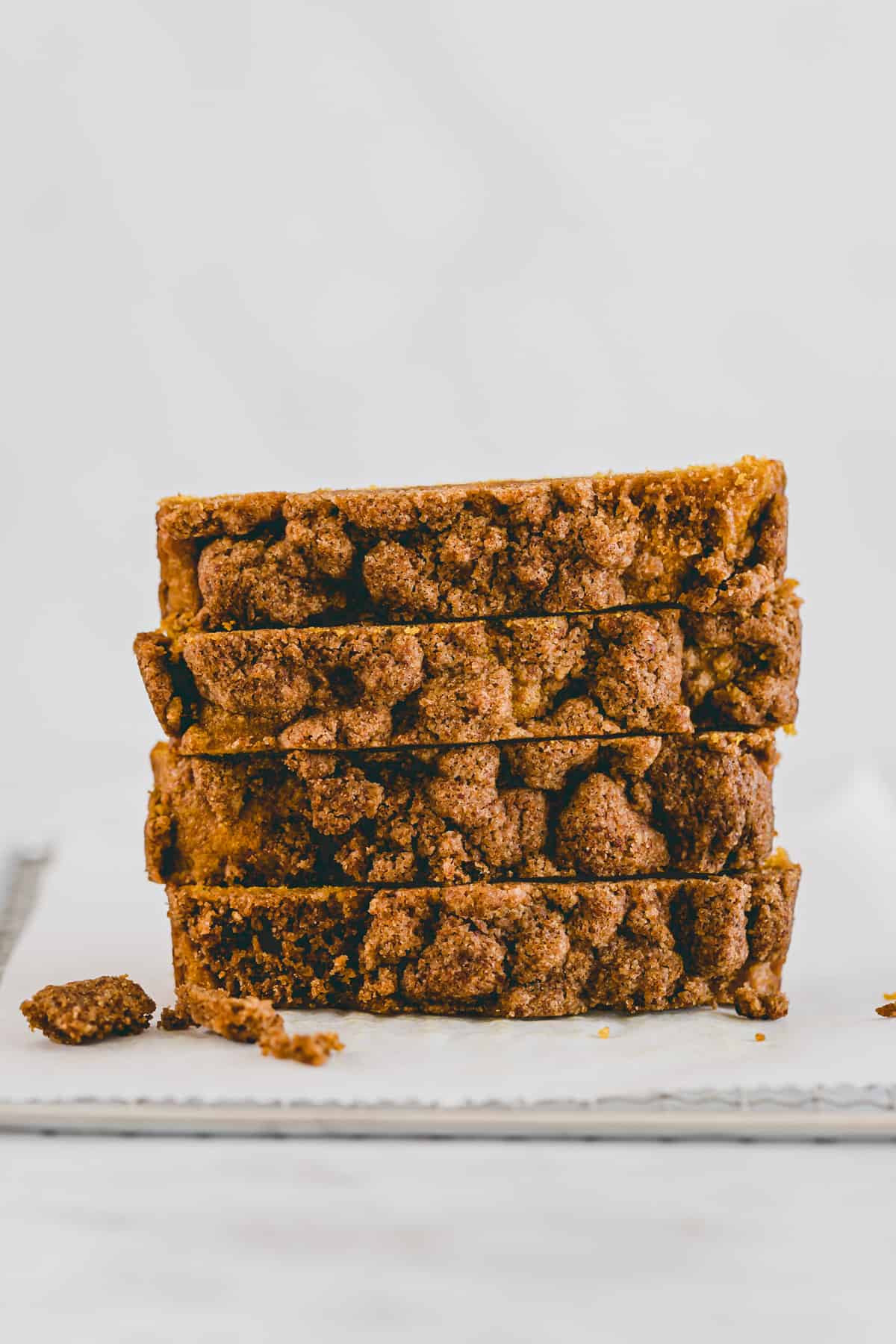 stacked slices of vegan pumpkin bread