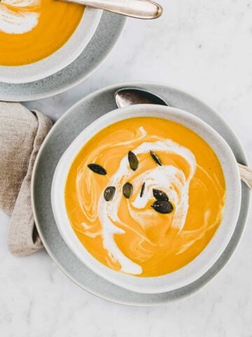 a bowl with pumpkin soup with ginger