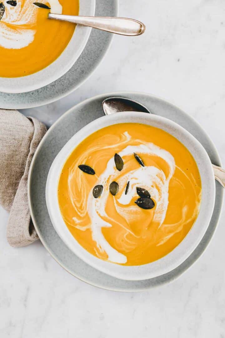 a bowl with pumpkin soup with ginger