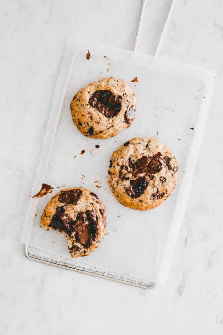 Vegan Oatmeal Chocolate Chip Cookies on a cooling wrack