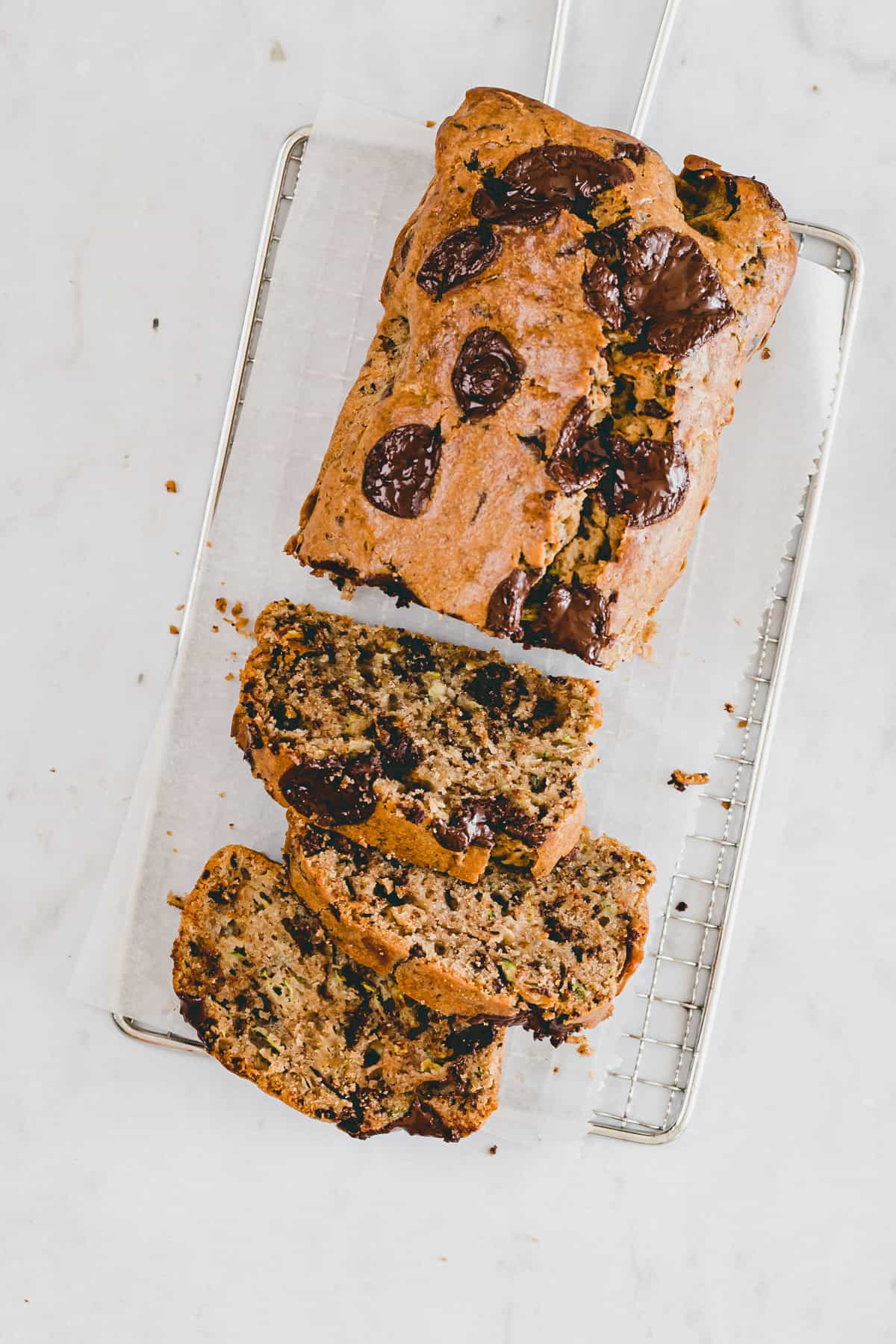 a loaf zucchini bread with chocolate chips on a wrack