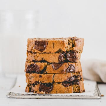 sliced healthy zucchini bread with chocolate chips stacked on top of each other