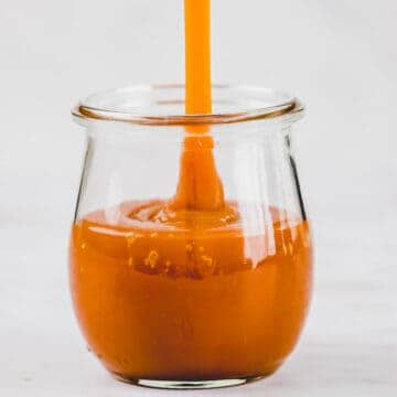 vegan caramel sauce in a tulip jar