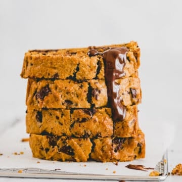 a stack of Vegan Pumpkin Chocolate Chip Bread slices