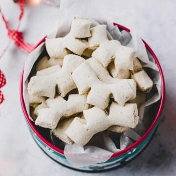 swiss anise cookies in a cookie tin