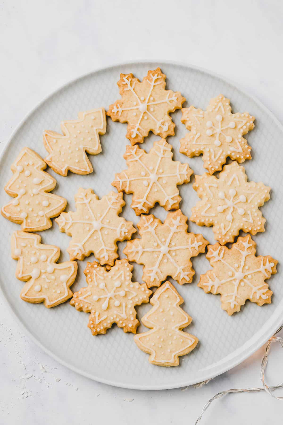 a blue plate with vegan sugar cookies