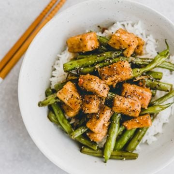black pepper tofu with green beans on rice