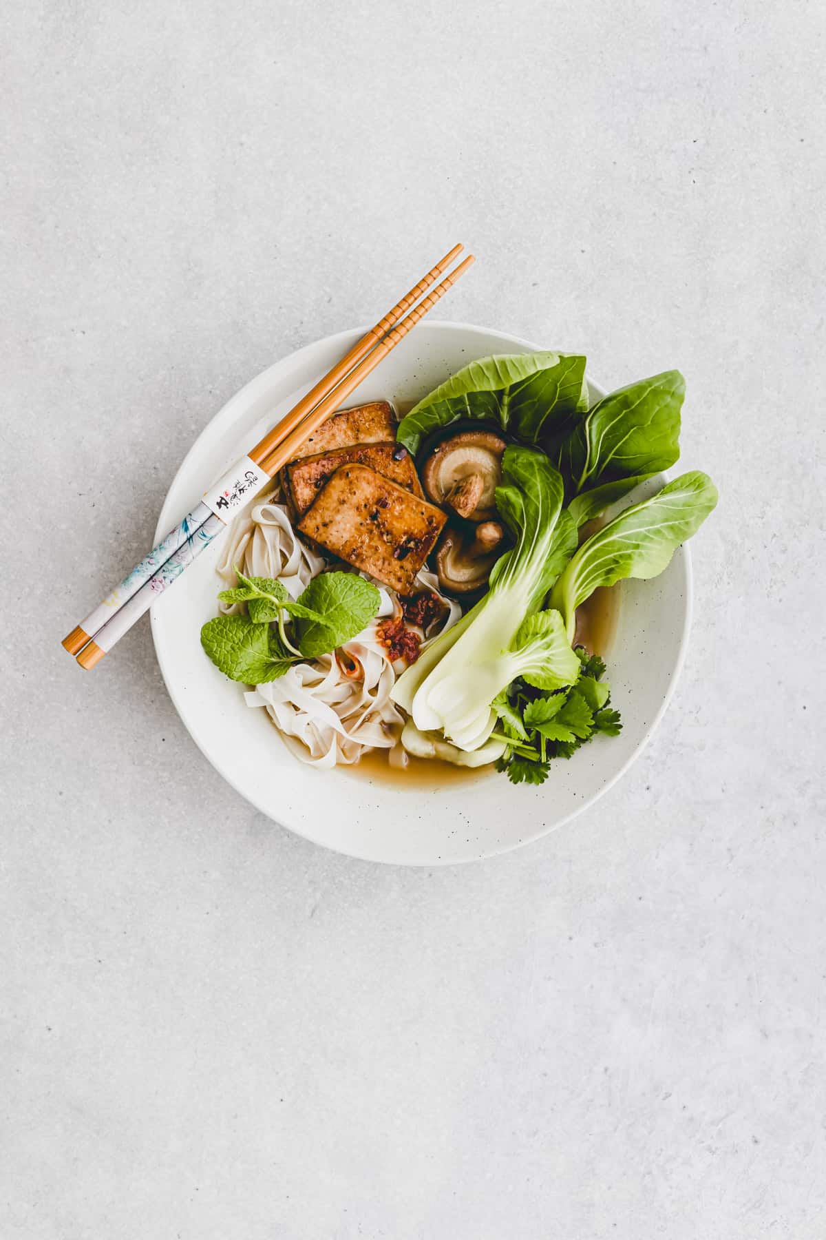 a bowl of vegan pho soup