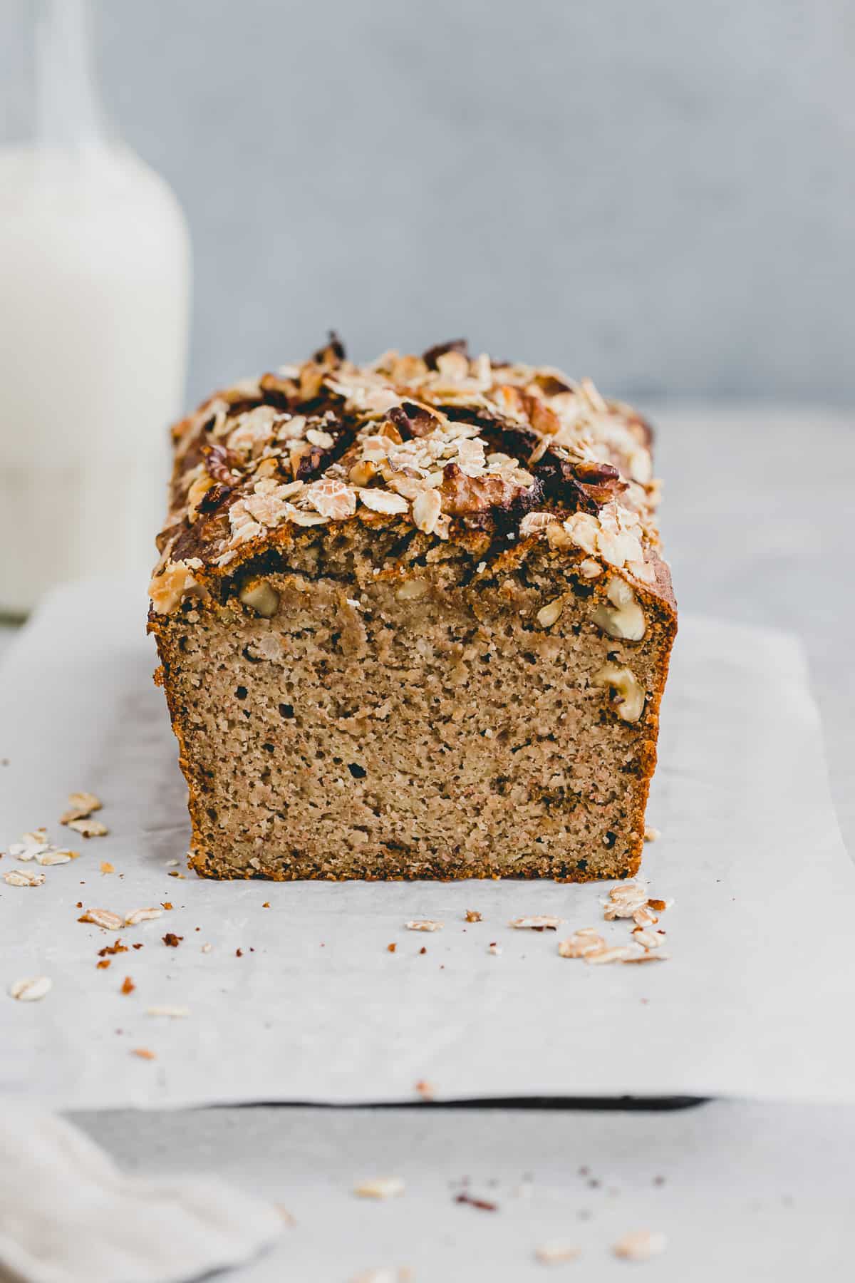 a loaf paleo banana bread with walnuts and oats