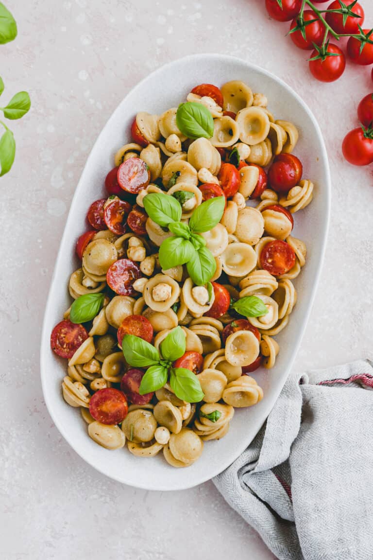 caprese pasta salad on a serving plate