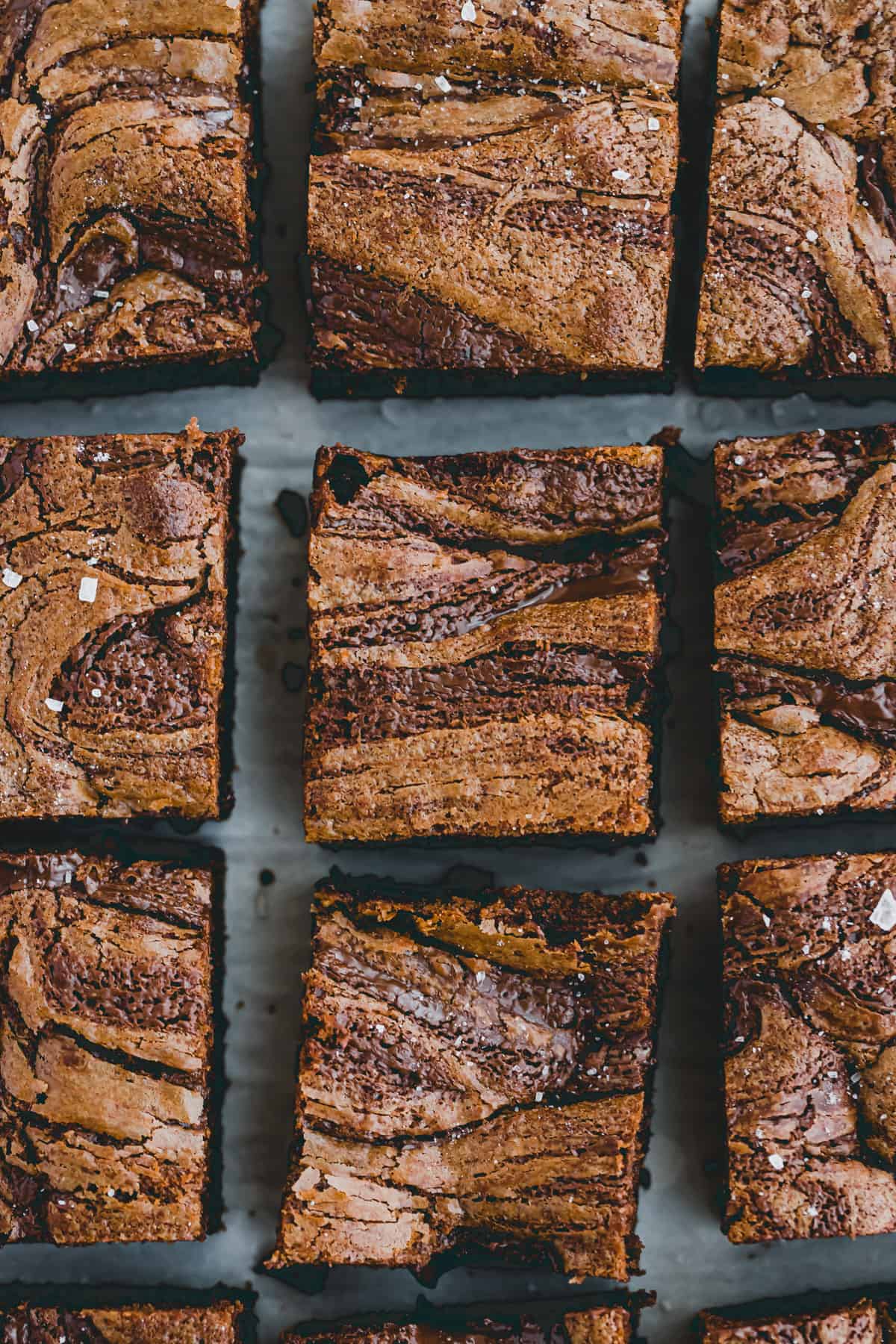 sliced nutella brownies on parchment paper