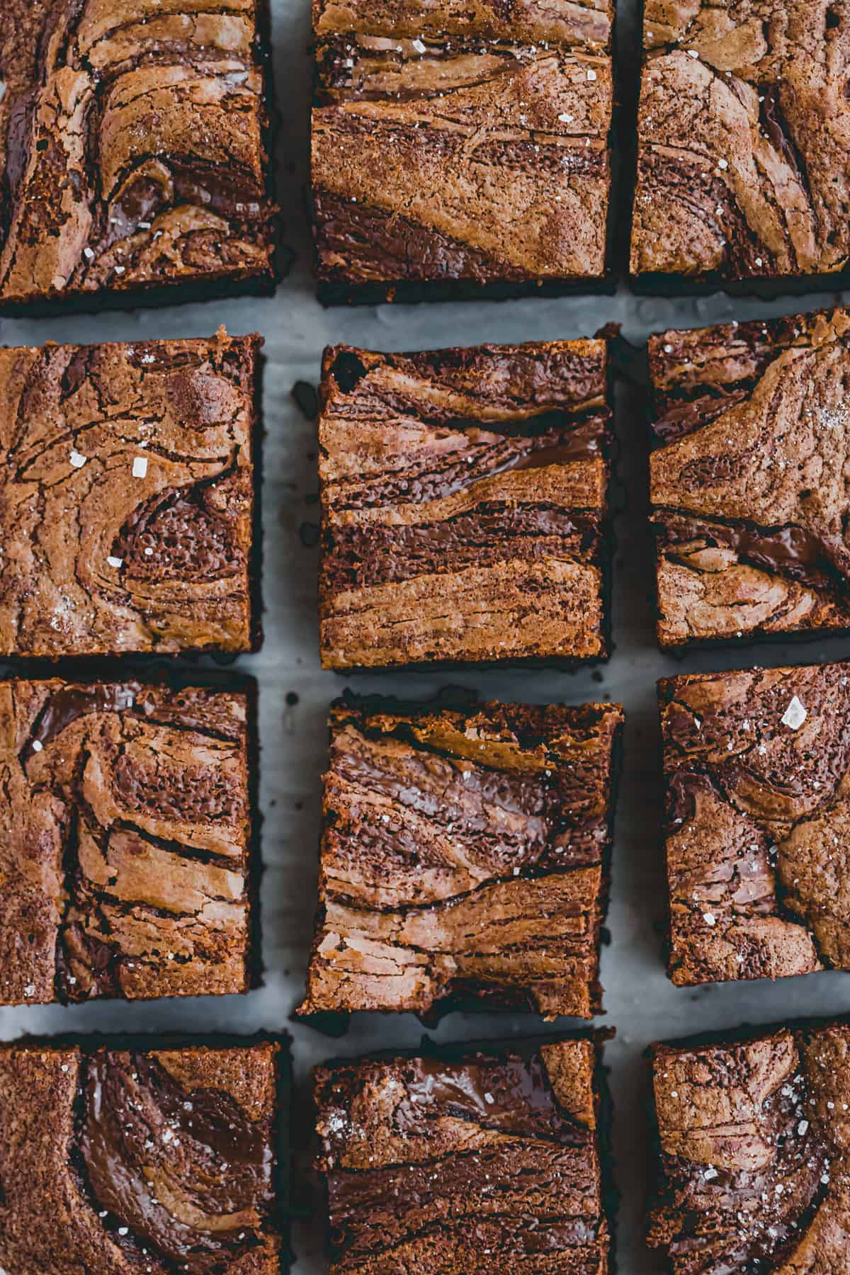 sliced nutella brownies on parchment paper