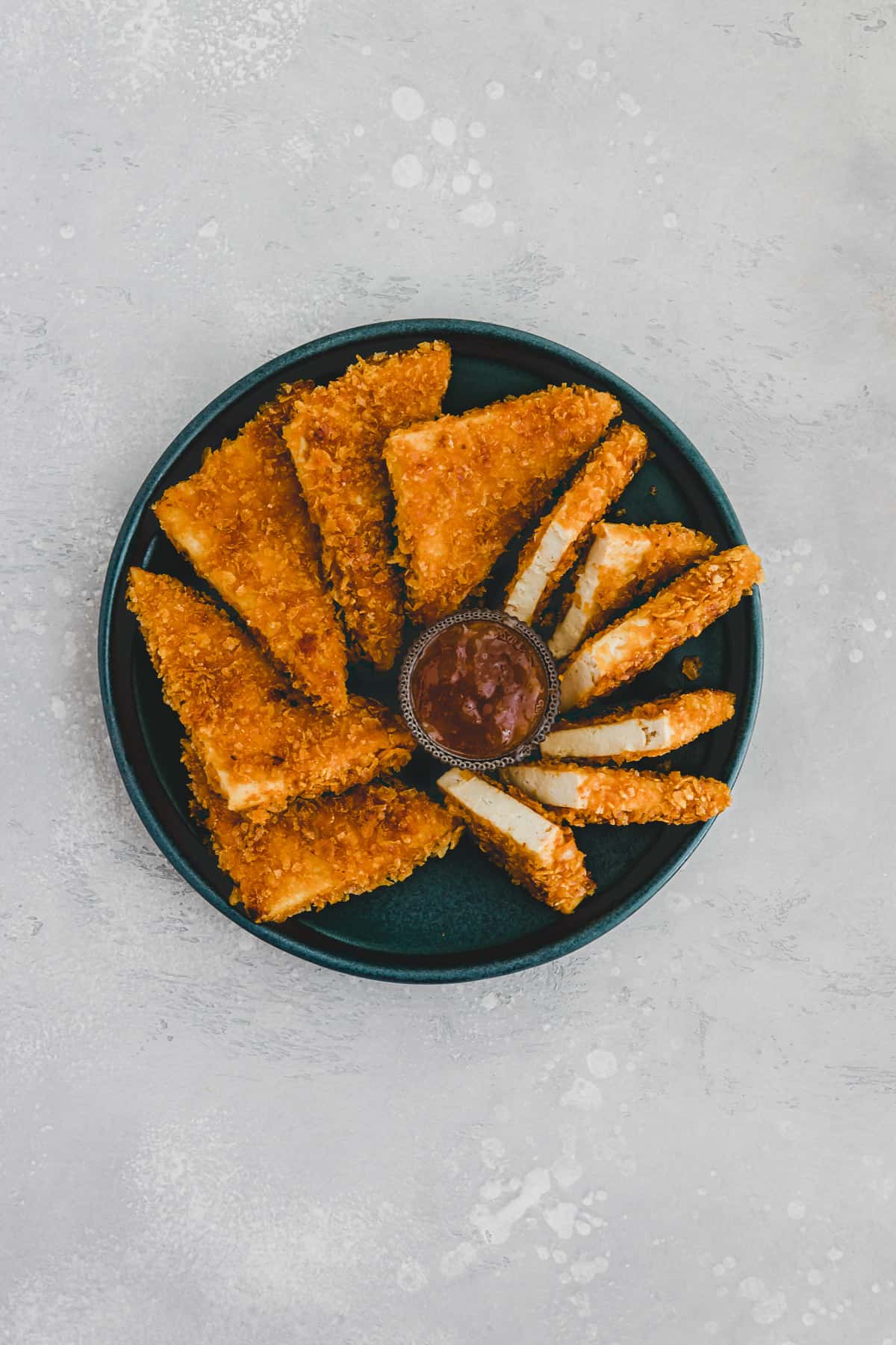 vegan tofu nuggets on a blue plate