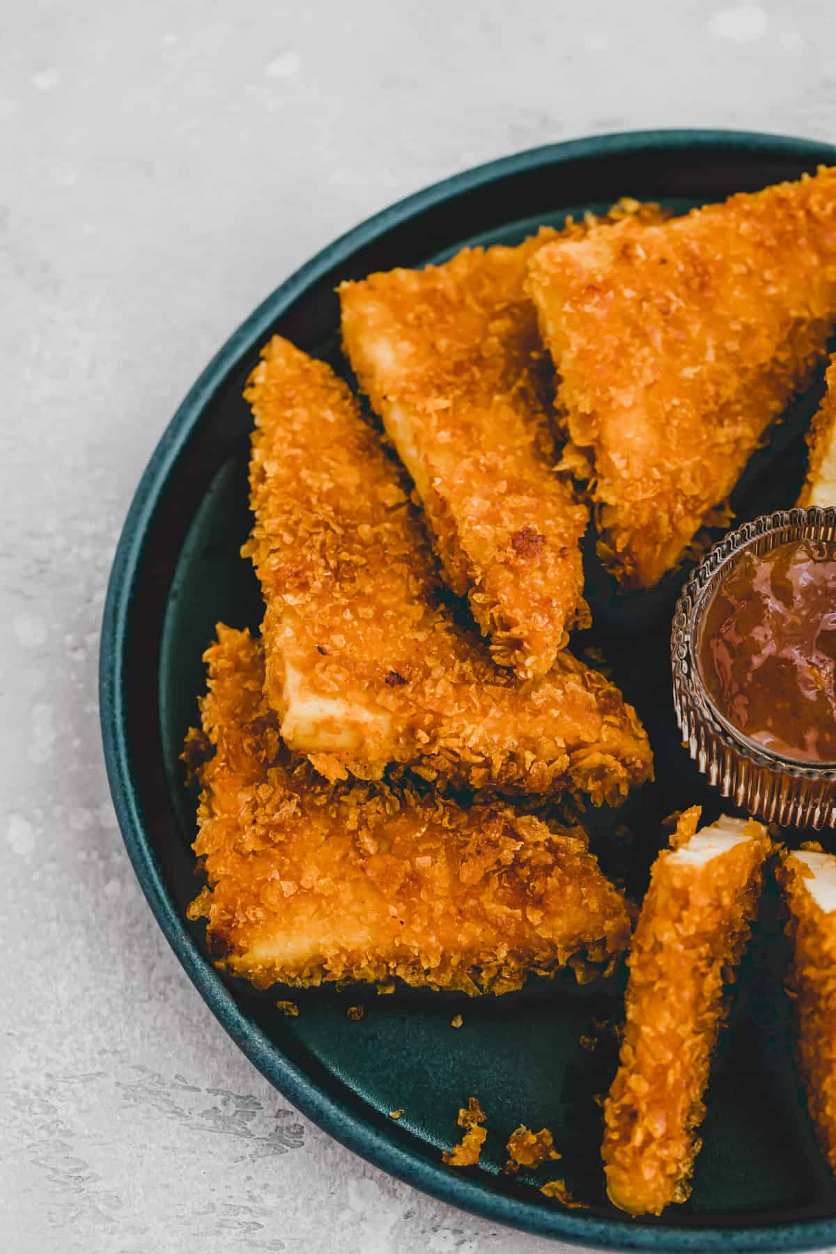 close up shot of vegan chicken nuggets with mango chutney