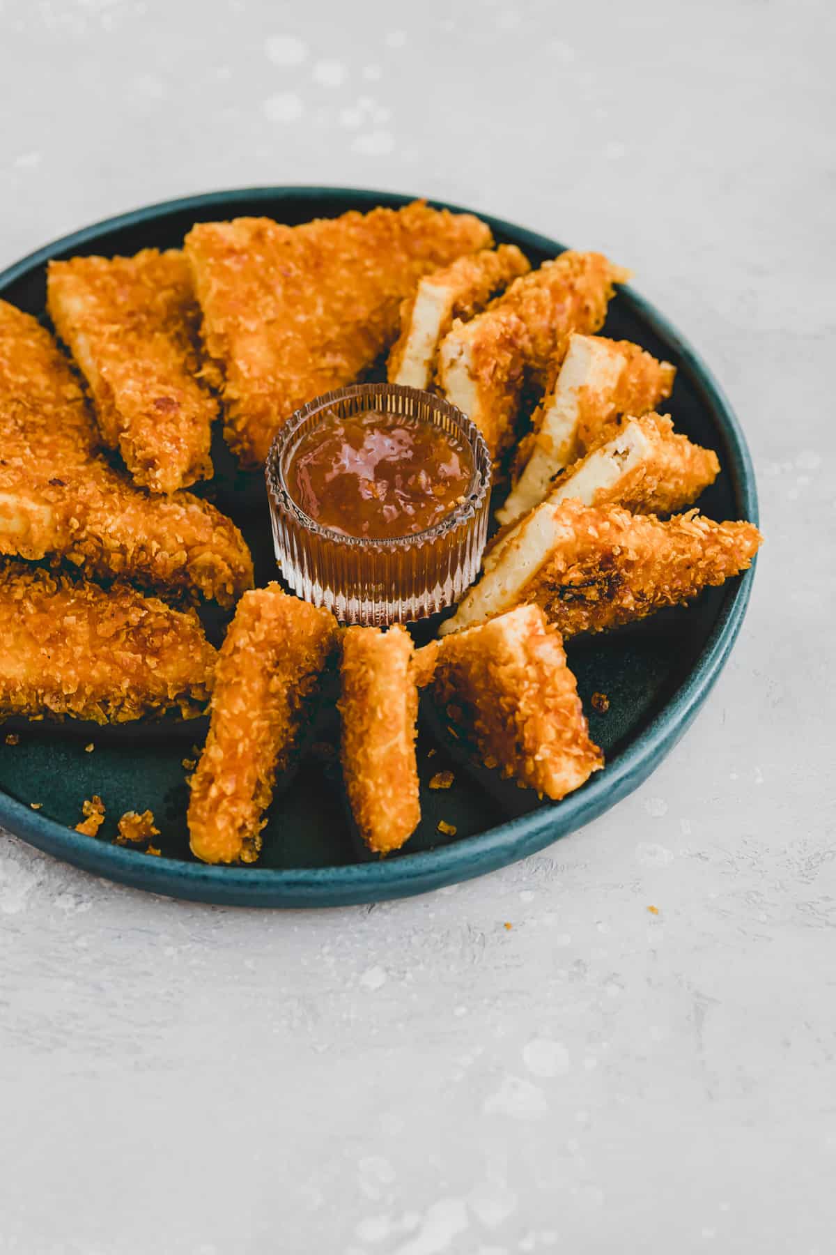 homemade vegan chicken nuggets on a blue plate