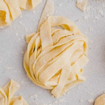 homemade pasta dough cut into noodles