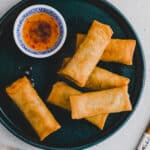 crispy thai spring rolls served with dipping sauce